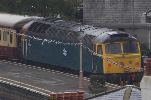 3 September 2022 - 16:38:21
No wonder Britannia was finding it hard going, diesel loco 47614 at the back, had his brake lights on.
----------------------
Steam loco Britannia arrives in Kingswear